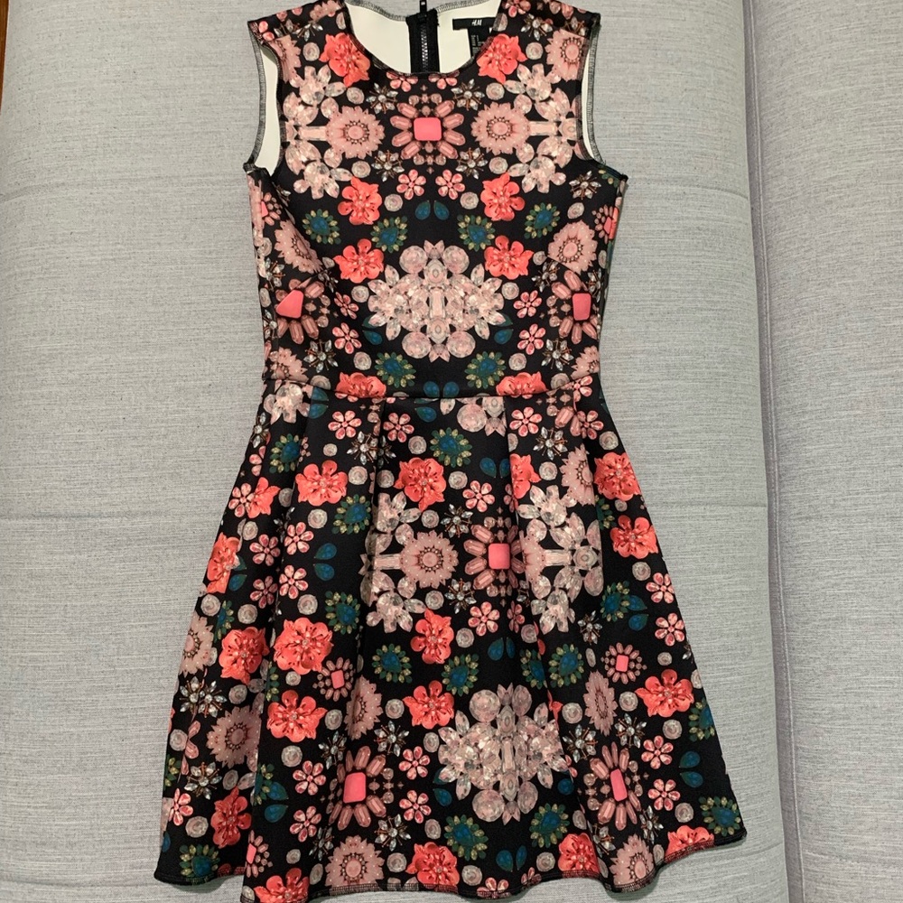 Jewelry-patterned dress.